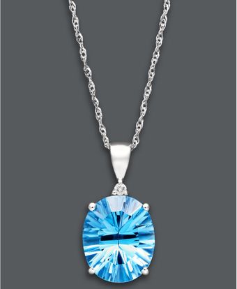  Blue Topaz and Diamond Accent Oval Pendant 