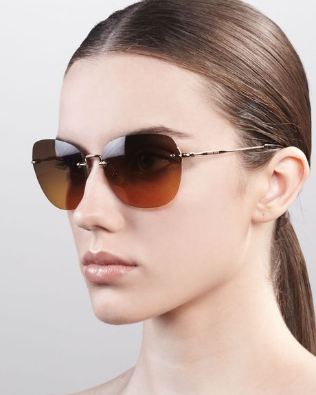 Miu Miu Frameless Oval Sunglasses in Brown (antique gold) - Lyst
