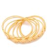 Tory Burch Logo T Stacking Bangle Set in Gold - Lyst
