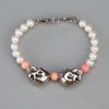 Alexander Mcqueen Double Skull Bracelet in White (pearl) - Lyst