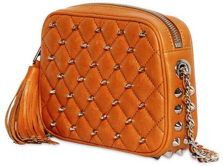 brown quilted handbag