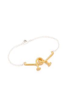 Tom Binns Voila Puzzle Nail Bracelet - Lyst