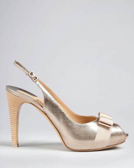 gold peep toe platform pumps