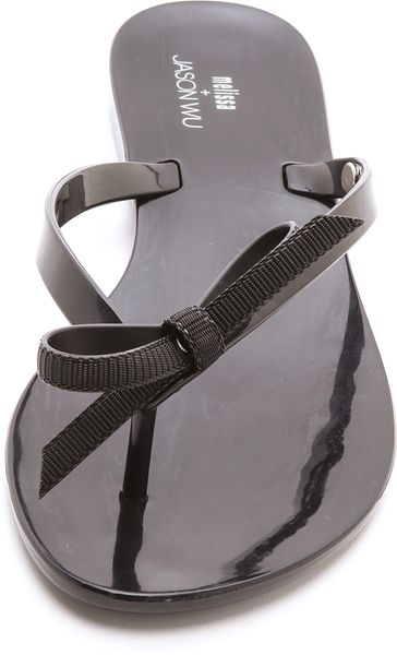 melissa black bow flip flops