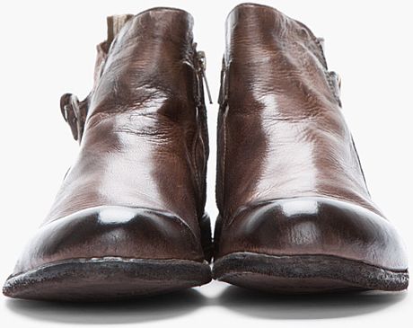 brown leather boots with straps
