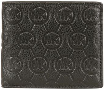 Michael by Michael Kors Embossed Monogram Billfold Wallet - Lyst