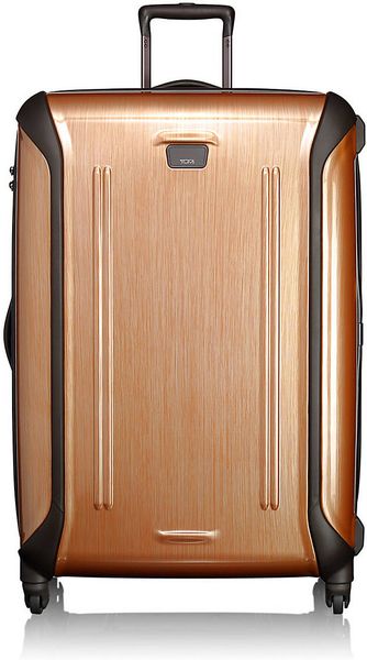 tumi gold luggage