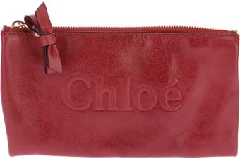 Chloé Logo Embossed Clutch Bag - Lyst
