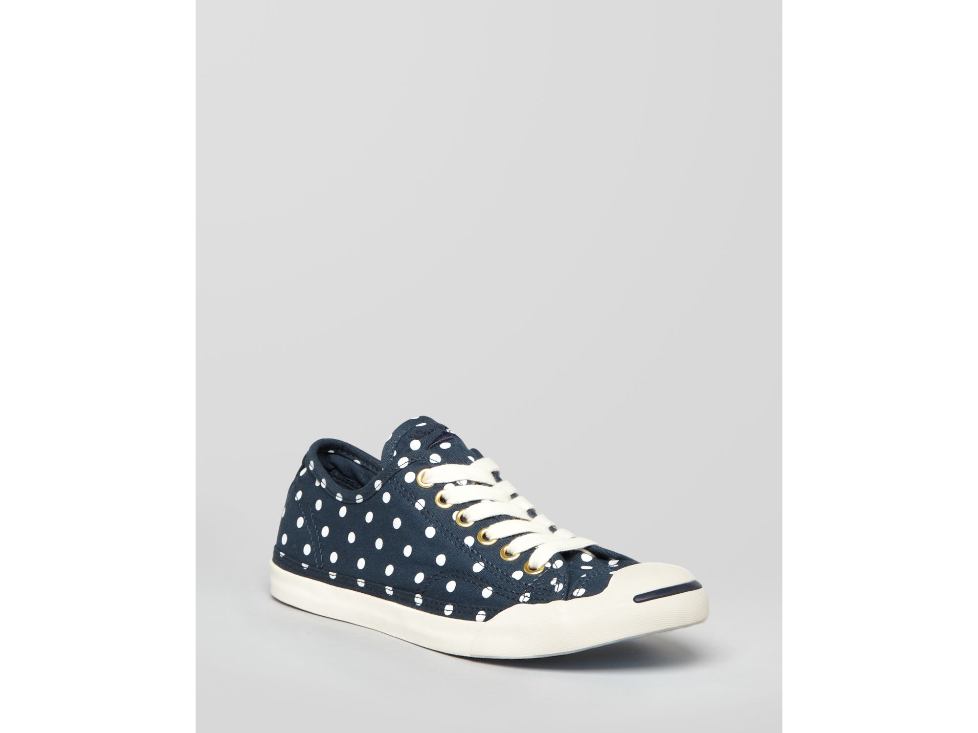 navy blue and white polka dot converse
