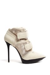 DKNY Newspaper Pulse Mesh and Snake High Top Platforms