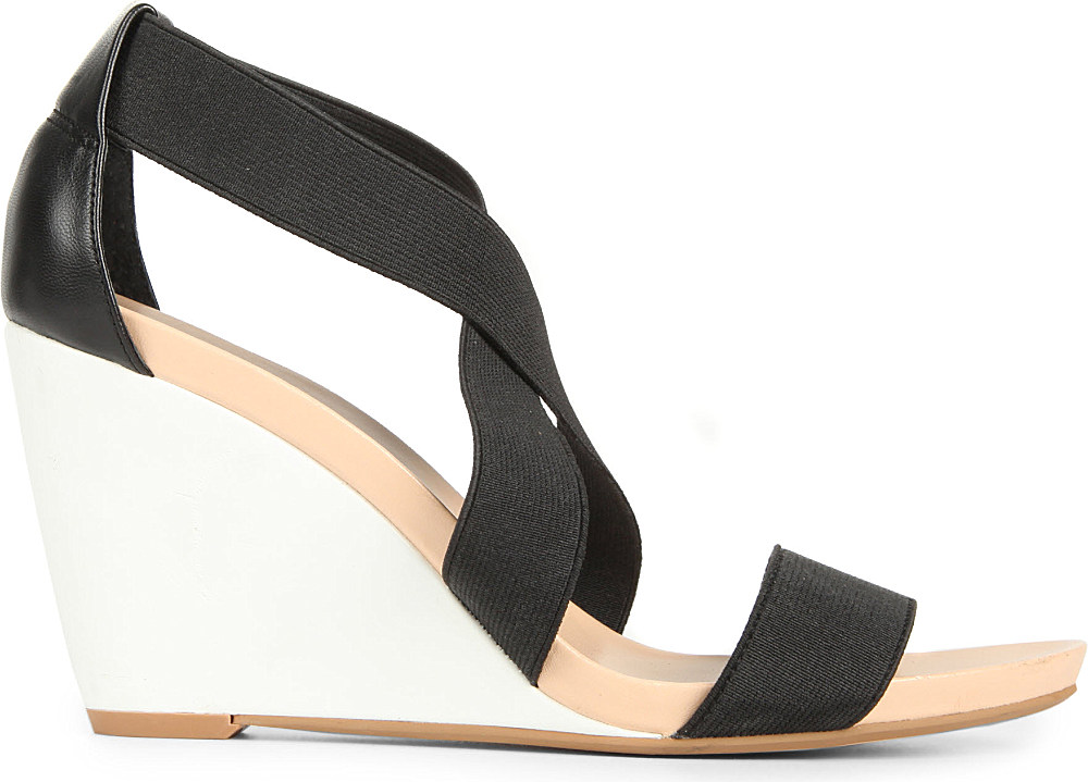 dune black wedge trainers