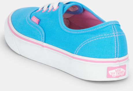 blue and pink vans slip ons