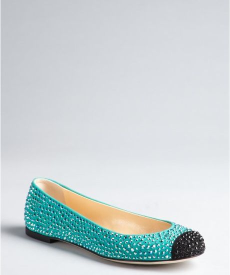 black flats with turquoise bottom