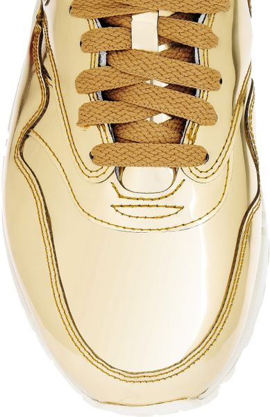 nike trainers with gold