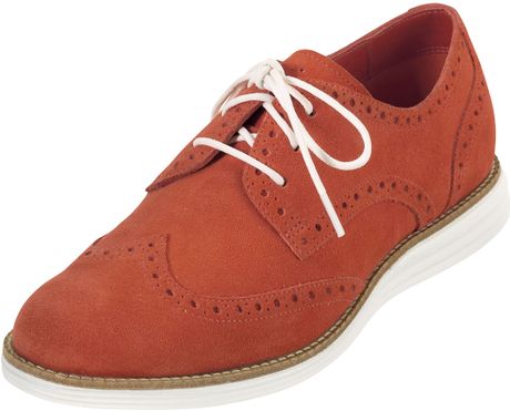 orange wingtip shoes