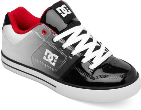 white and red dc shoes