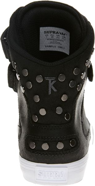 black trainers with studs