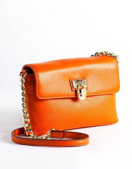 orange cross bag