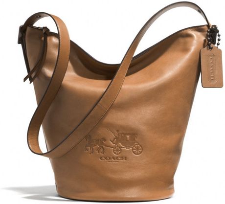 Coach Bleeker Leather Large Duffle coach bleecker logo duffle bag in leather in brown Coach Bleeker Leather Large Duffle coach bleecker logo duffle bag in leather in brown
