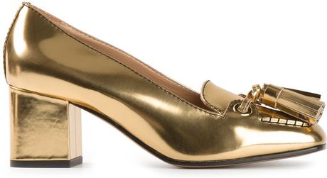 tasseled gold loafers