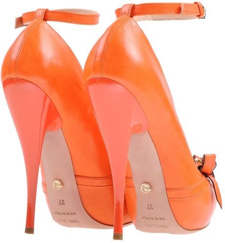 orange platform pumps
