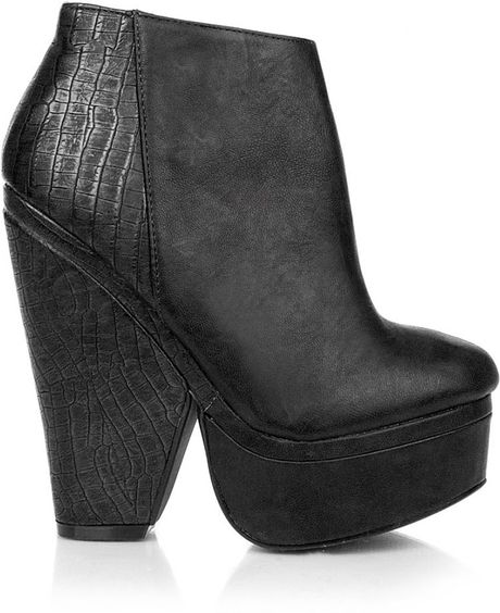 black snake print heeled boots