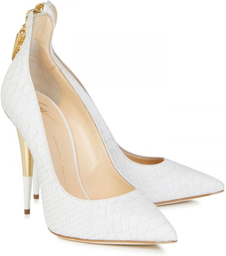 white snakeskin pumps