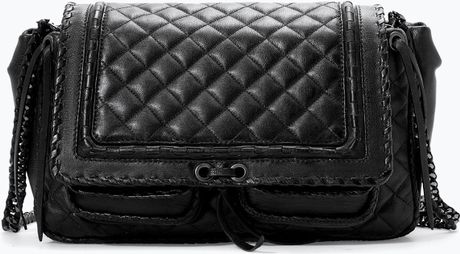 fleece trim quilted city bag