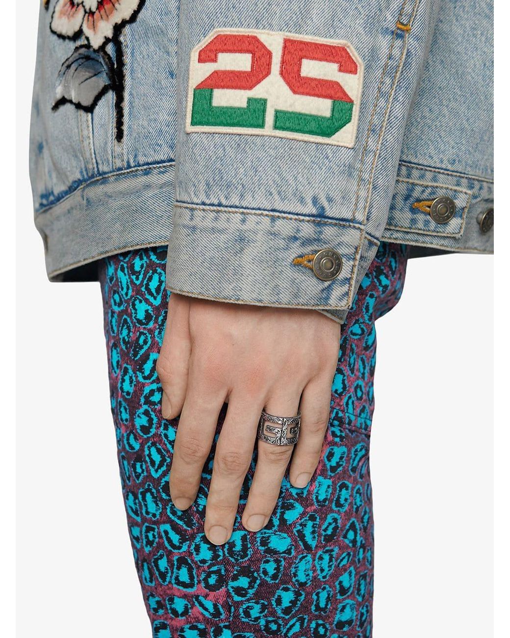 silver ring with square g