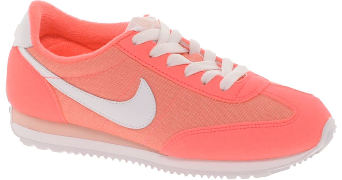 nike legend pink trainers