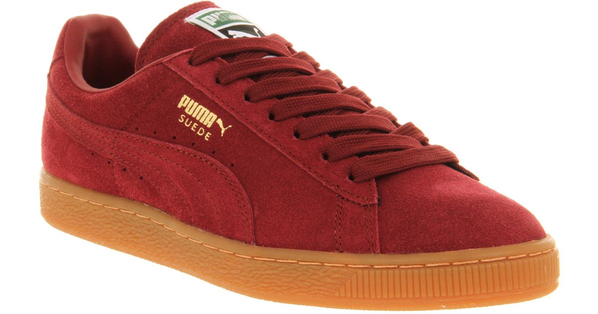red pumas with gold