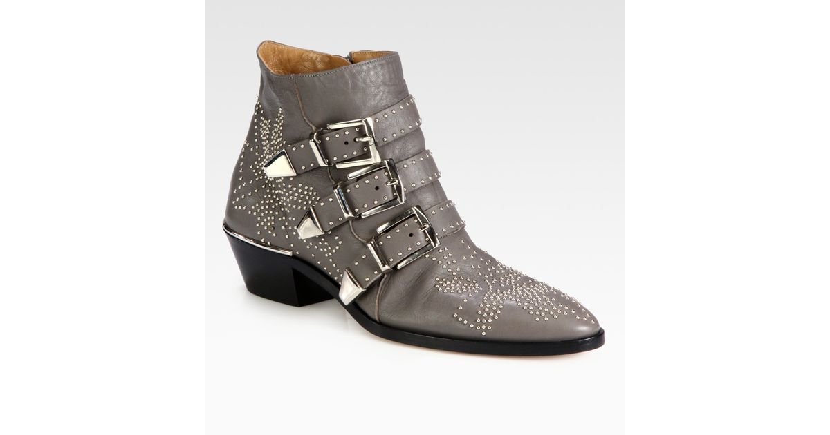 studded flat leather ankle boots with buckles