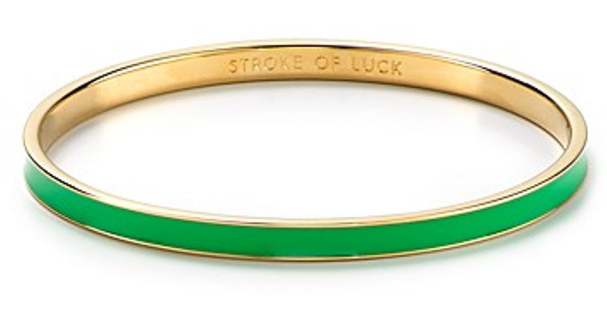 Lyst Kate Spade New York Stroke Of Luck Idiom Bangle In Green