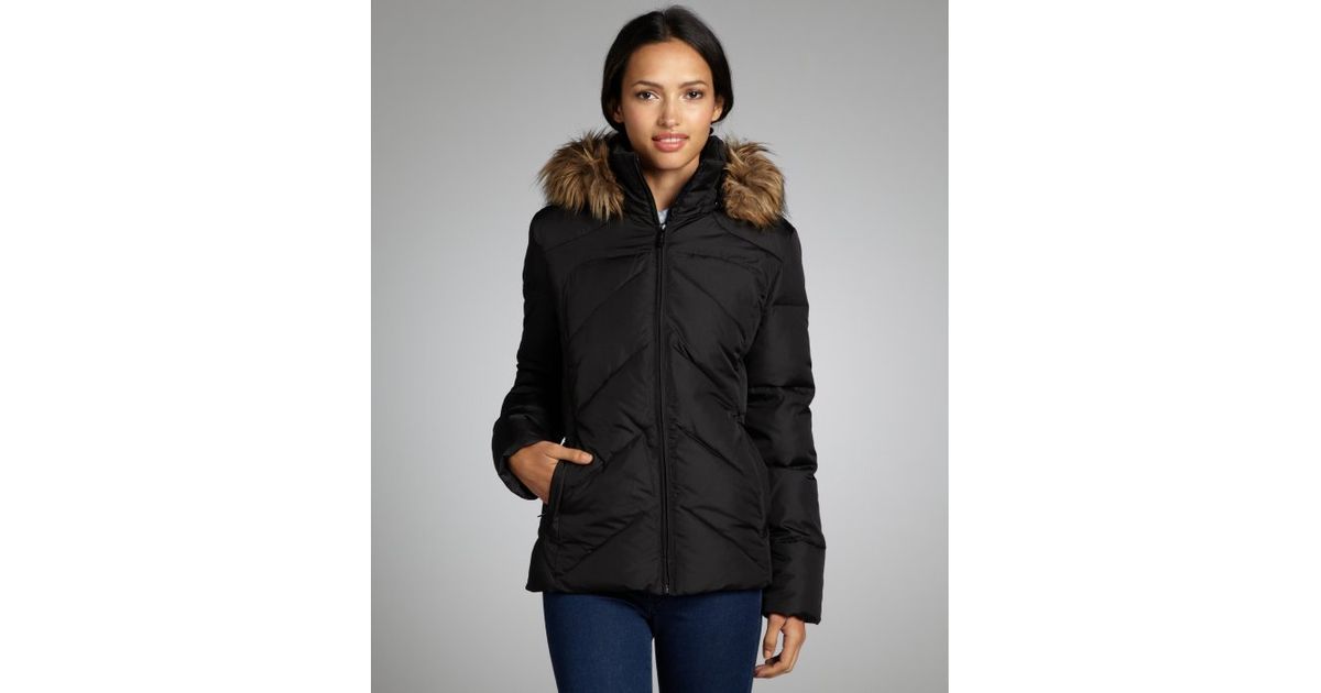 Lyst - Calvin Klein Black Quilted Faux Fur Trimmed Hooded ...