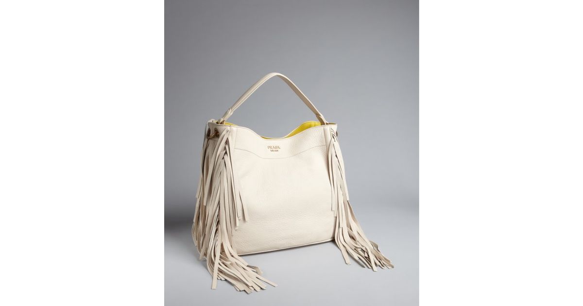 Prada White Pebbled Leather Tassel Trim Shoulder Bag in White | Lyst  