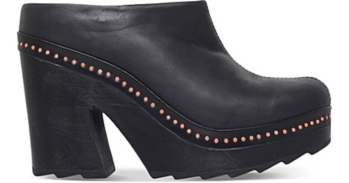 leather studded mules