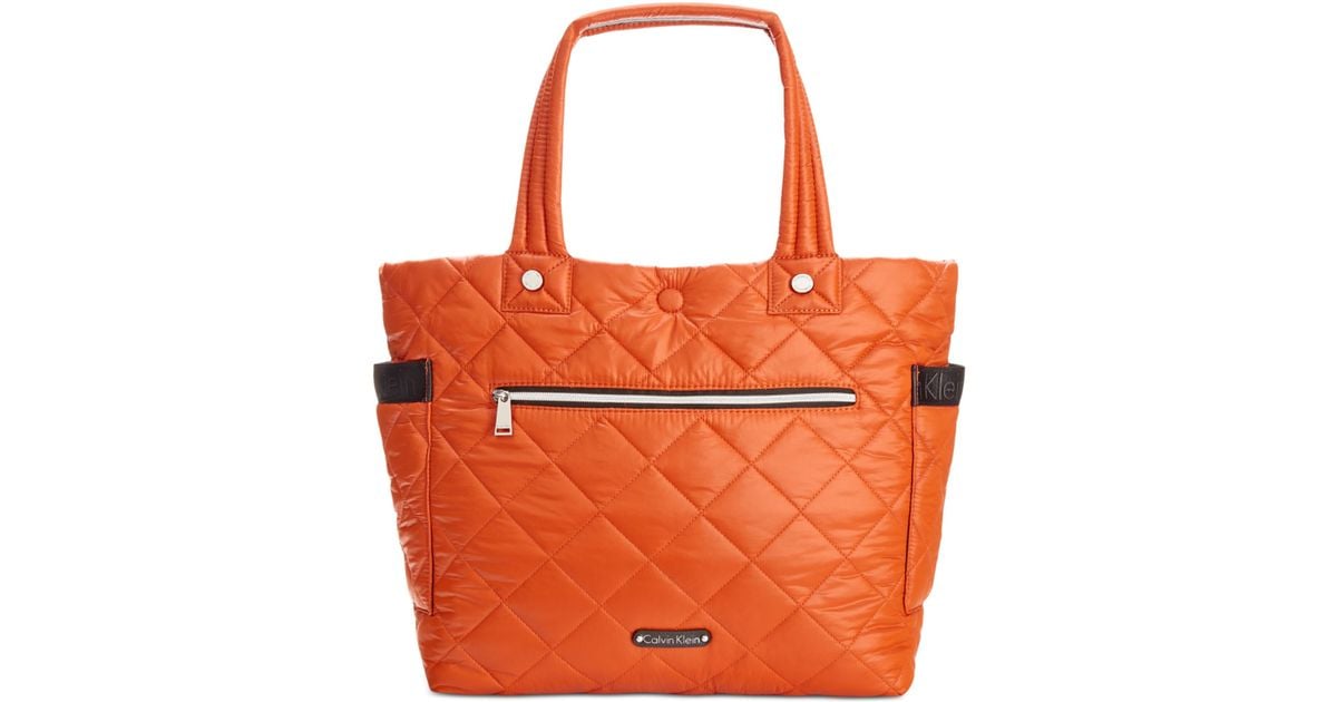 Calvin klein Cire Reversible Extra Large Quilted Nylon Tote in Orange