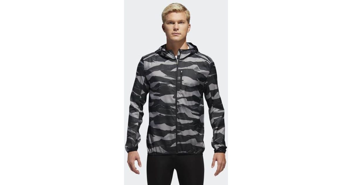 own the run graphic wind jacket