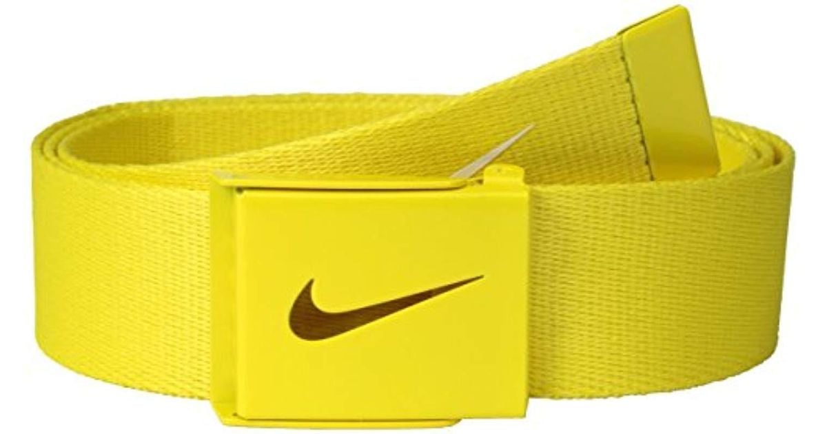 nike tech yellow pants