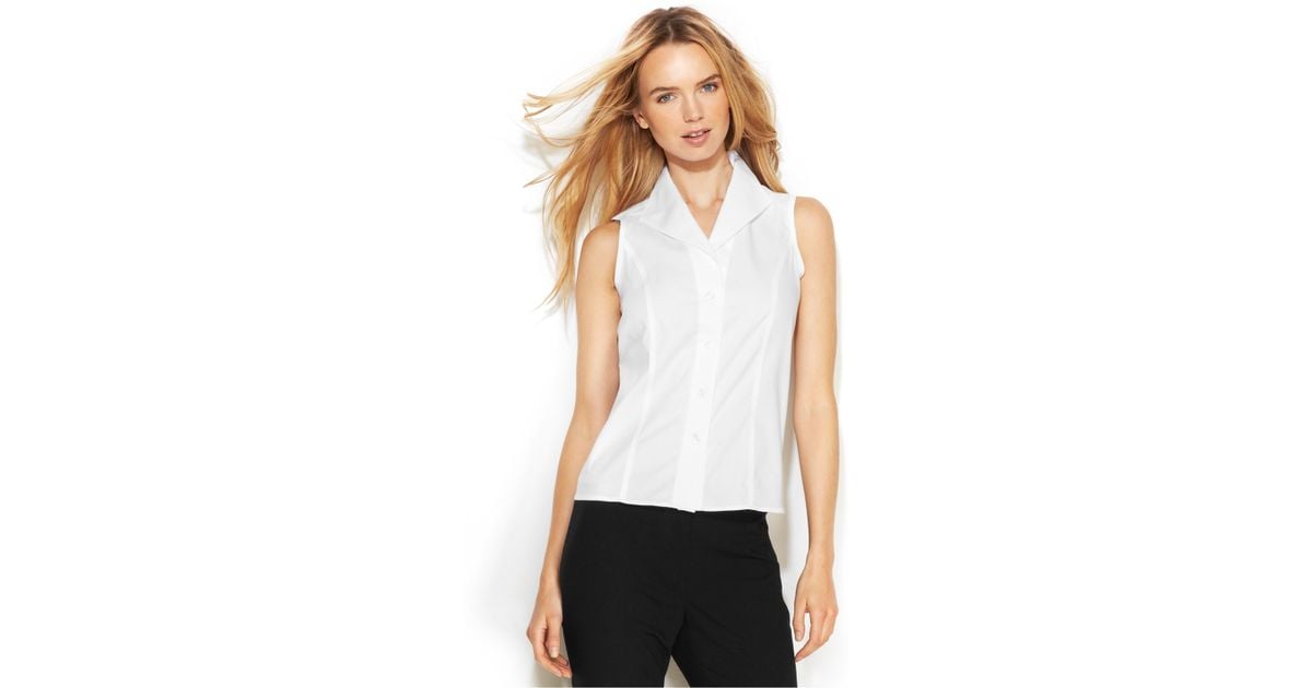 sleeveless white button up