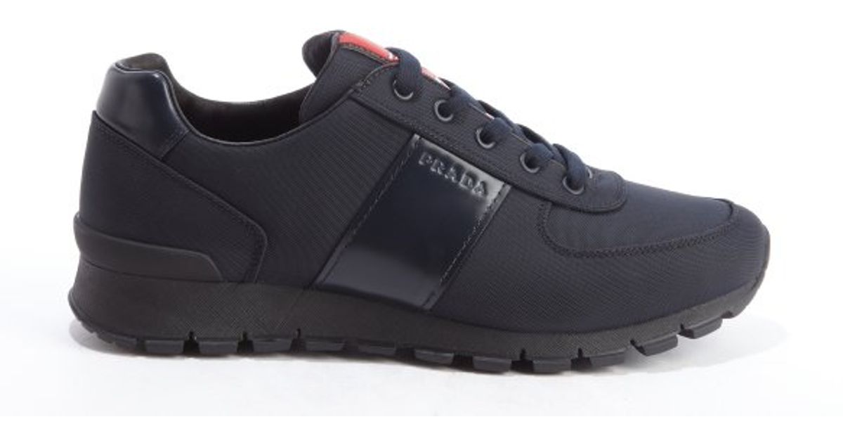 navy prada trainers