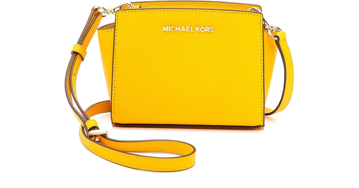 Lyst Michael Kors Selma Mini Messenger Bag Chili In Yellow