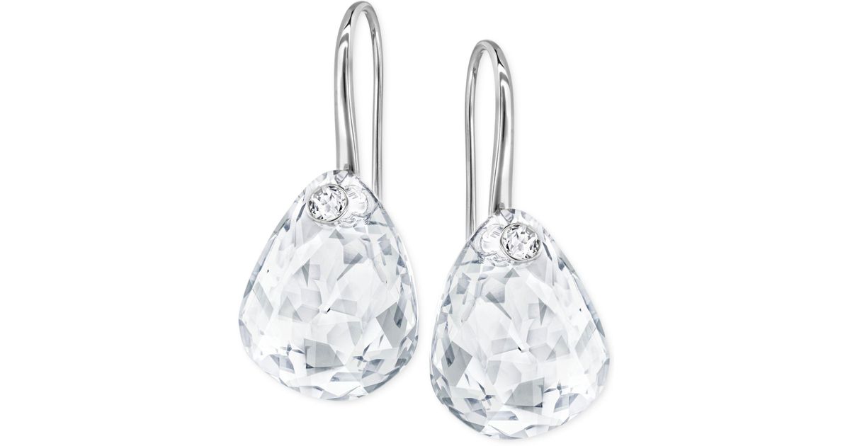 Lyst Swarovski Gold Tone Large Crystal Drop Earrings In Metallic