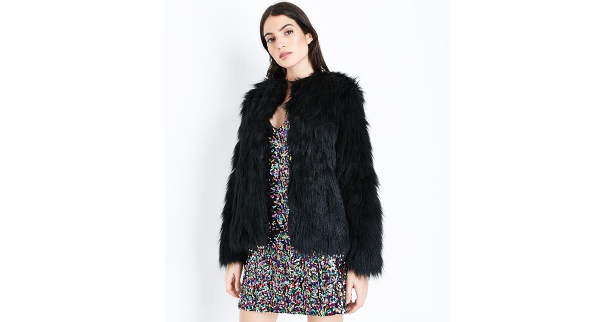 New Look Black Collarless Fluffy Faux Fur Jacket In Lyst