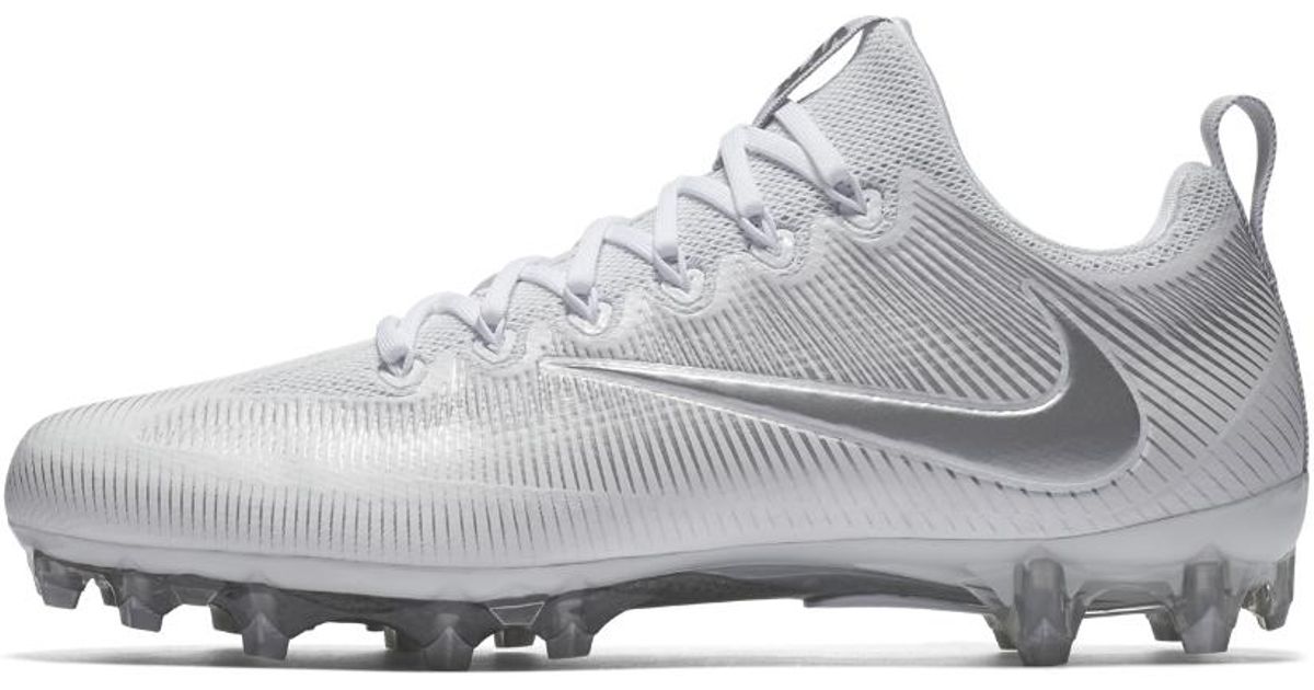 white and silver football cleats