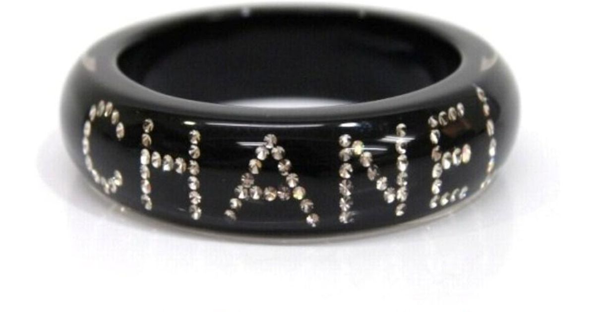 Lyst Chanel 03a Logo Rhinestone Bangle Bracelet Black Plastic In