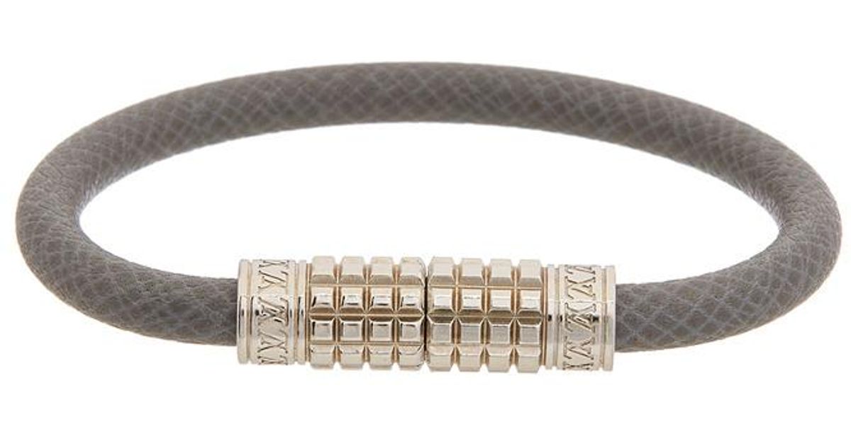 Lyst Louis Vuitton Grey Taiga Leather Digit Bracelet In Metallic