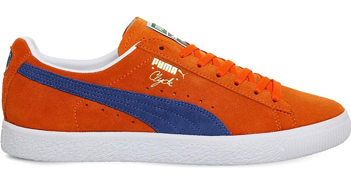 PUMA Clyde Lace-up Suede Trainers in Orange - Lyst