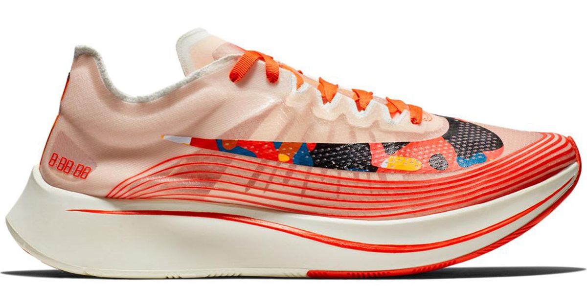 camo and orange sneakers