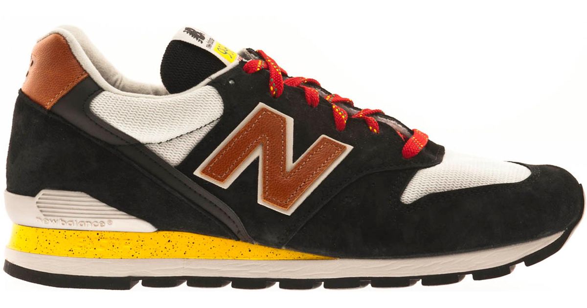 new balance black yellow